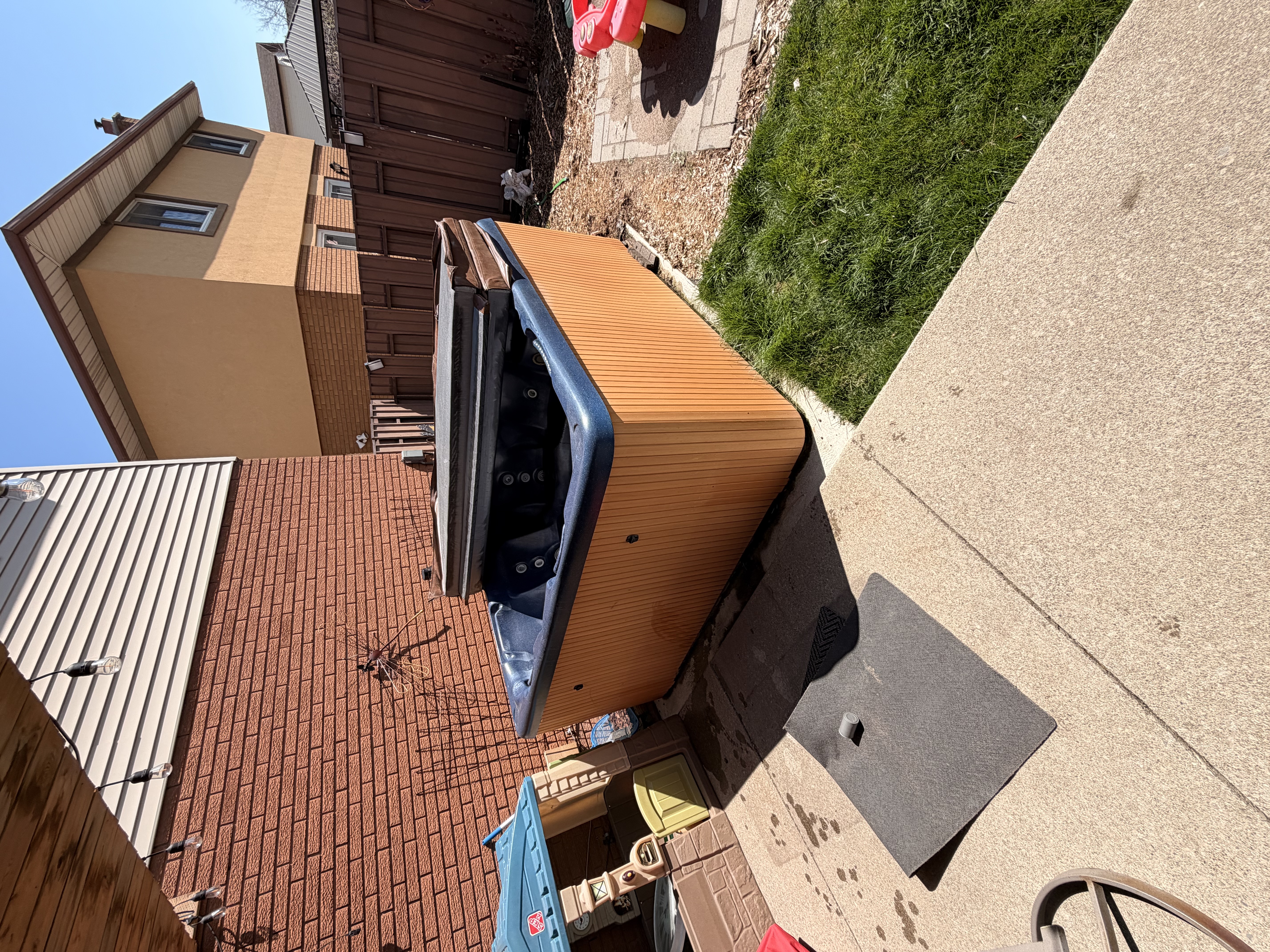 Hot tub before removal in Brantford backyard
